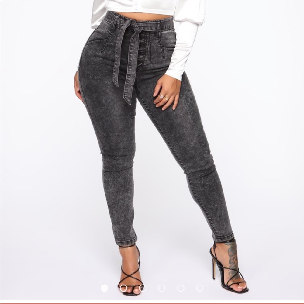 Never worn “all wrapped up high rise jeans”